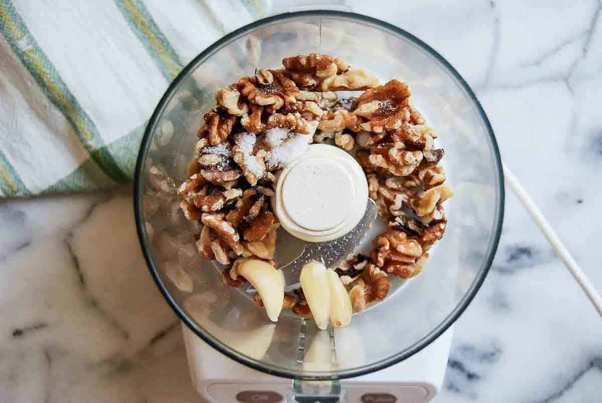 walnuts, salt and garlic in food processor.