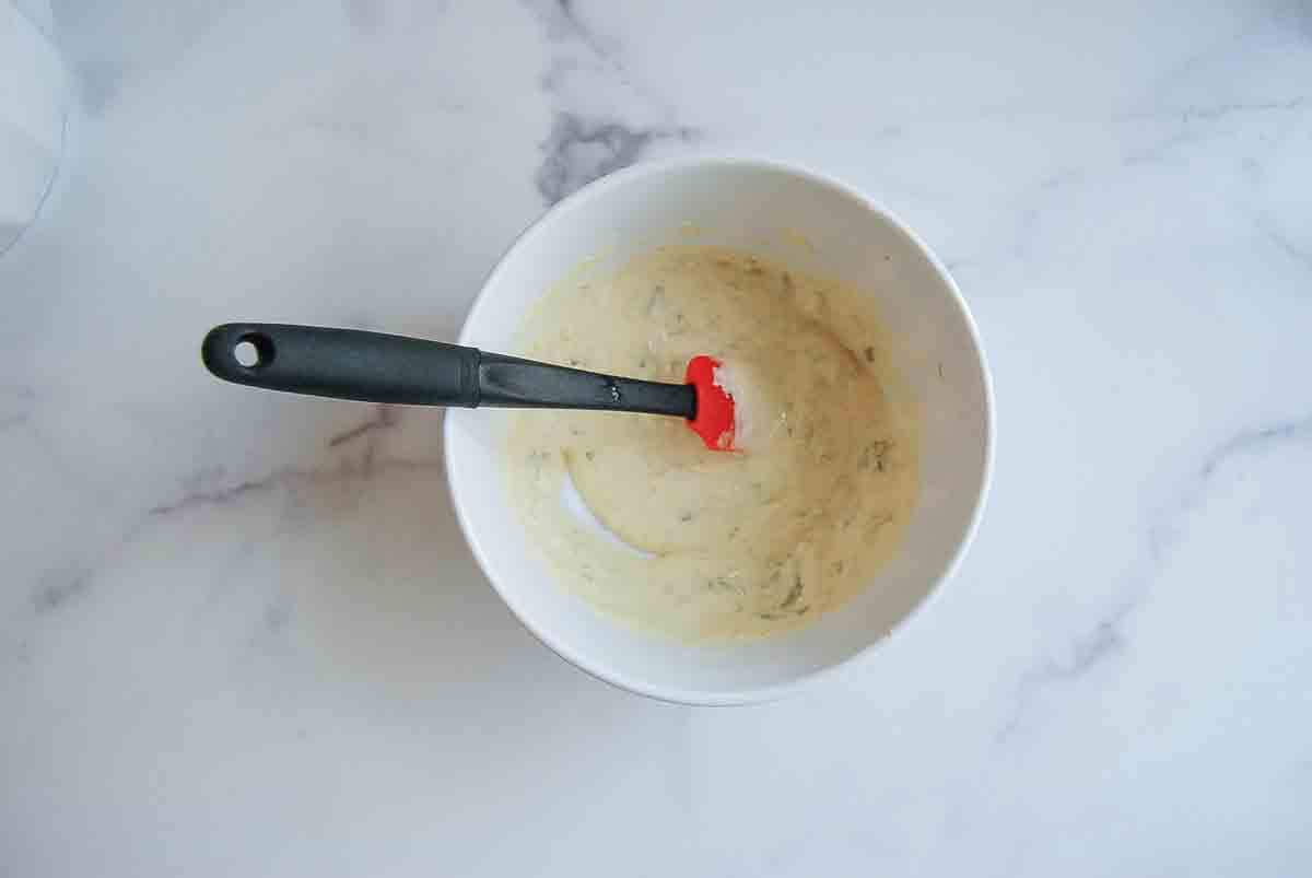 creamy mayo and sweet pickle relish in a mixing bowl.
